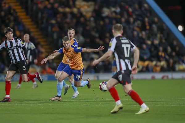 Rhys Oates in possession for Mansfield against Grimsby. Photo: Chris & Jeanette Holloway / The Bigger Picture.media