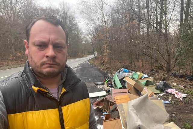 Councillor Jason Zadrozny at the scene of the fly-tip