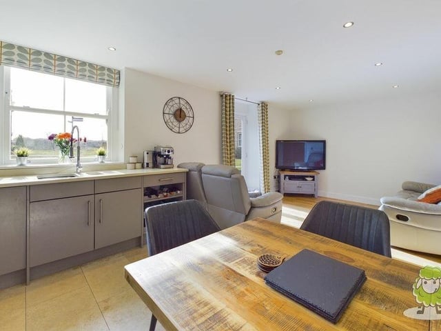 Much of the ground floor at the Berry Hill Lane house is taken up by an open-plan kitchen/lounge/diner. Here is part of the kitchen section, where there is room for a dining or breakfast table.