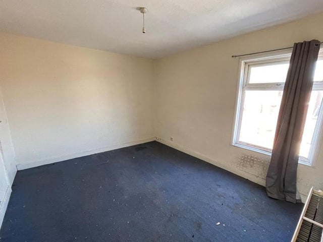The cupboard is bare at the moment, but the second bedroom has plenty going for it, especially in terms of size. The window faces the back garden.