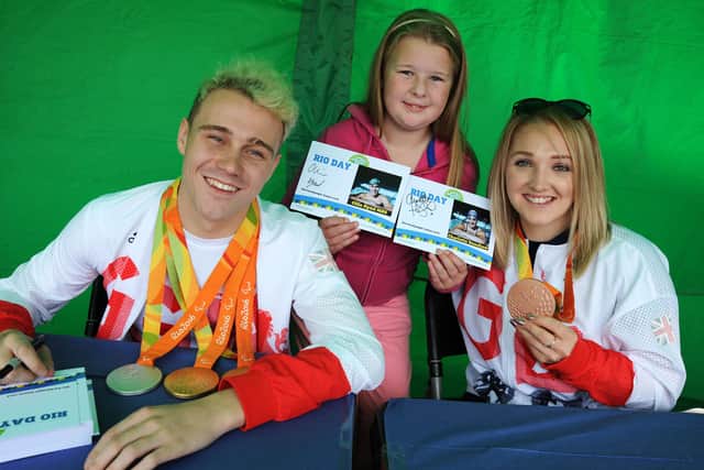 Charlotte had a successful career in swimming before moving to paracanoe, pictured here with fellow paralympian Ollie Hynd.