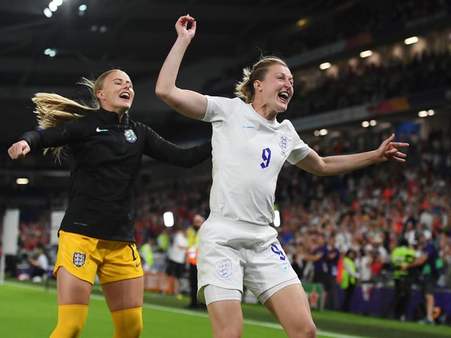 Hannah Hampton and Ellen White celebrate victory.