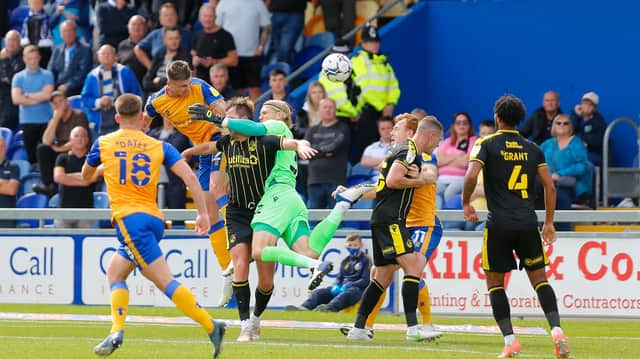 Oli Hawkins heads Mansfield Town into the lead. Pic by Chris HOLLOWAY @ TheBiggerPicture.media