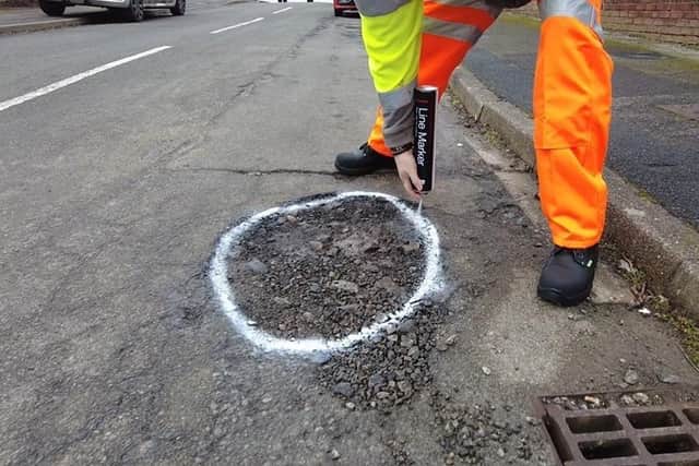 Road workers have noticed an increase in abuse from motorists as they tackle potholes.