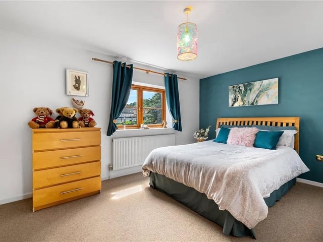 One of four double bedrooms in the spacious property.