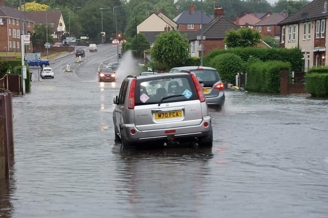 Mr Lancashire shared a photo with wheels submerged in water on the Sutton street. Photo taken in the Spring Bank area.