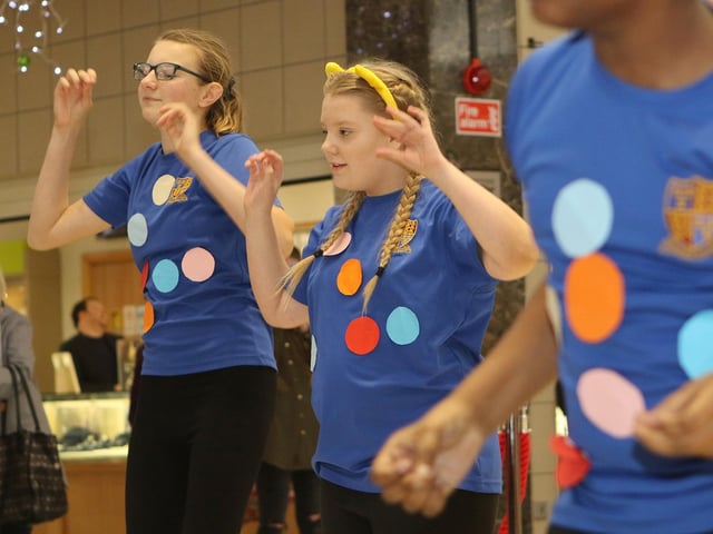 The dancers from Queen Elizabeth School school drop into the Four Seasons Shopping Centre to perform as part of their Dance Dash fundraiser for Children in Need