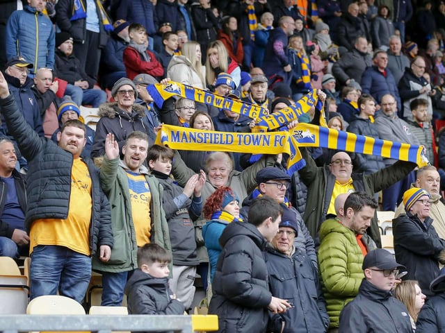 Travelling Stags fans watch the Sky Bet League 2 match against Bradford City.