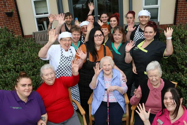 Baily House staff and residents celebrate their achievement