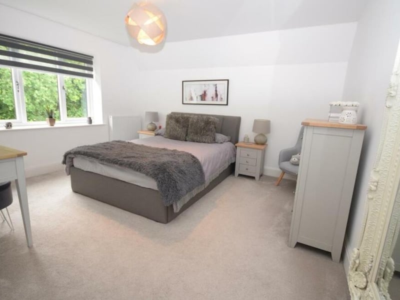 Bedroom number three enjoys further spacious proportions and is decorated in cool, refreshing tones.