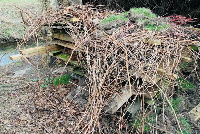 In recent weeks, residents said a new fence on green space by the river bank at the bottom of Wood Street was erected and the old fence was dismantled and left as a ‘bug house’ for ecology purposes.