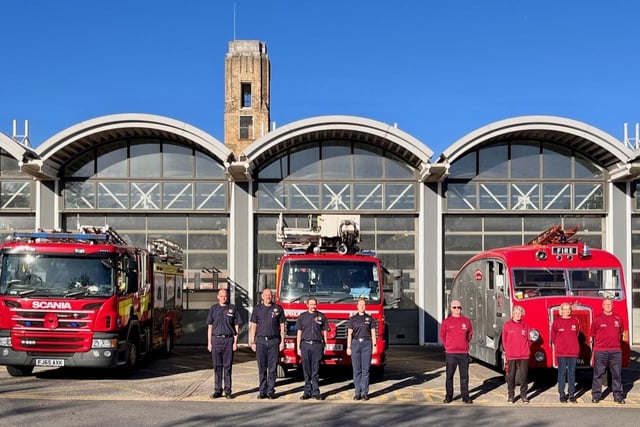 The duty watch at Mansfield Fire Station and members of Mansfield Fire Museum standing to attention outside the fire station on Saturday, November 11, at 11am