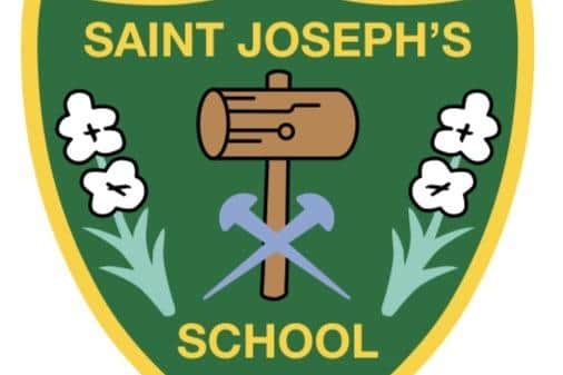 The crest of St Joseph's Catholic Primary School in Langwith Junction, which has been rated 'Outstanding' by the education watchdog, Ofsted.