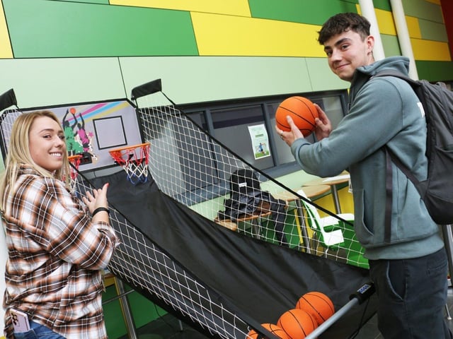 Learning support assistant Michaela Carlyle at the basketball game with health and social care student Joel Bailey.