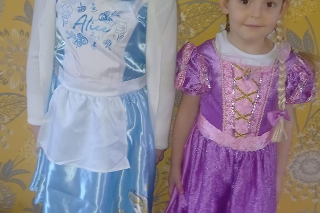 Emily aged seven and Imogen aged four from Clipstone as Alice in wonderland and Repunzel.