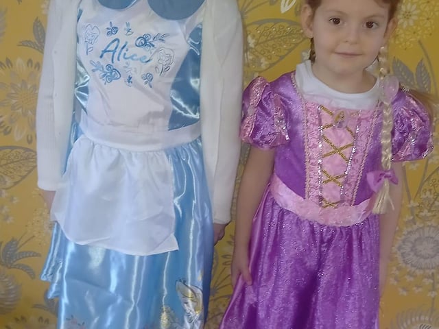 Emily aged seven and Imogen aged four from Clipstone as Alice in wonderland and Repunzel.