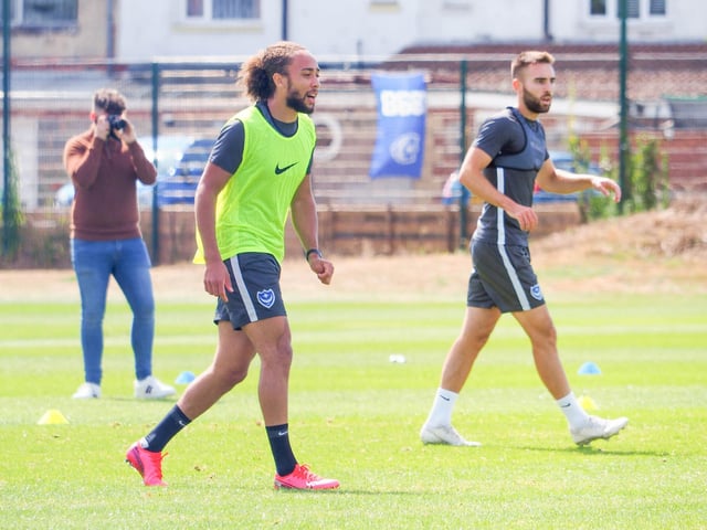 Marcus Harness alongside midfielder Ben Close.  Picture: Habibur Rahman