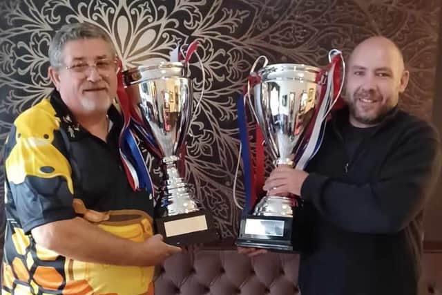 Garry Bennett and Gareth Smith with their trophies from Blackpool.