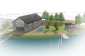 An artist's impression of the modern, new boathouse and water sports centre, complete with first-floor restaurant, that is proposed for King's Mill Reservoir in Sutton.