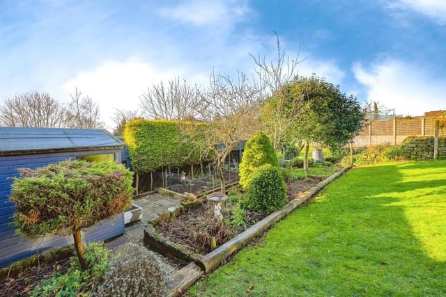 The last photo in our gallery captures another corner of the rear garden. Estate agents Burchell Edwards say: "The garden is an amazing space and reflects the pride the current owners have for their home."