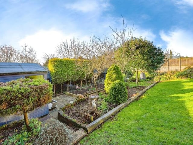 The last photo in our gallery captures another corner of the rear garden. Estate agents Burchell Edwards say: "The garden is an amazing space and reflects the pride the current owners have for their home."