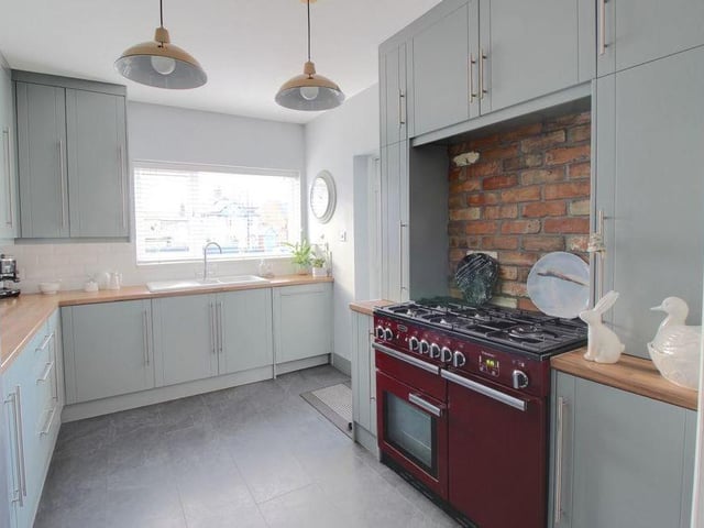Here is the bespoke kitchen, which has lots of storage, as well as room for all your modern-day appliances.