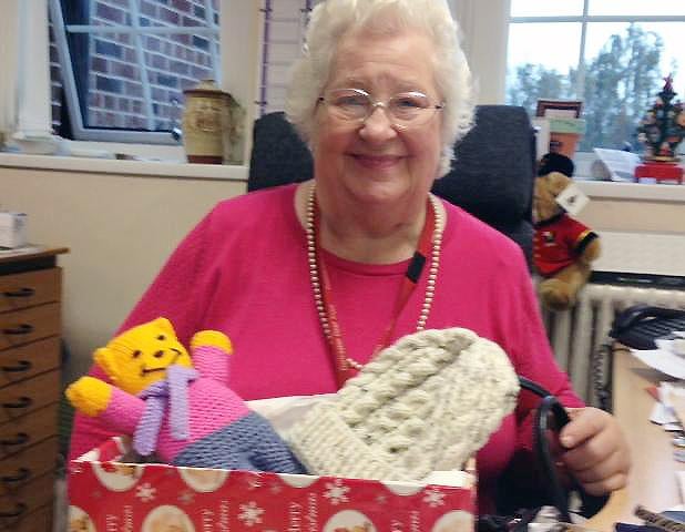 Bobbie Roberts, chair of Doncaster Deaf Trust, with one of the Christmas boxes donated for the Samaritans Purse Appeal in 2013