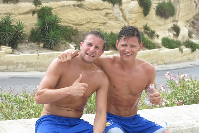 Jamie McGuire and James Jennings take a moment for water in Malta in 2013.