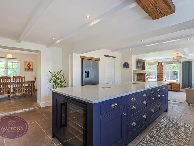 The dining kitchen and family room enjoys an open plan layout, perfectly for family life