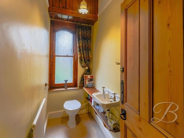 As well as the bathroom and en suite facilities, there are two more toilets on the first floor. Here is one of them.