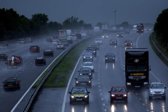Traffic drives through heavy rain on the M5(Photo by Matt Cardy/Getty Images)