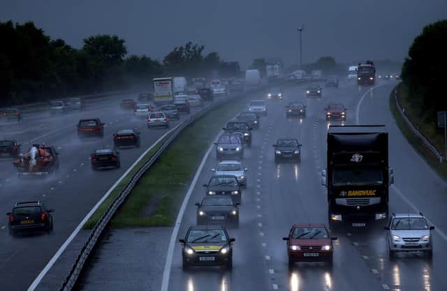 Traffic drives through heavy rain on the M5(Photo by Matt Cardy/Getty Images)