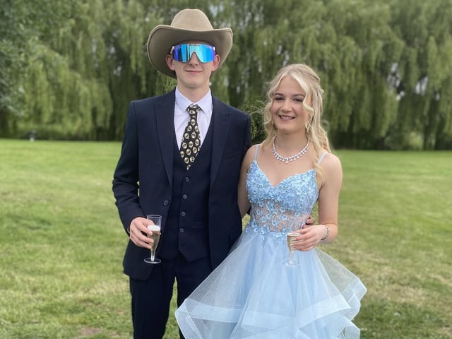 Tom W and Bella B preparing to celebrate at the Meden School prom.