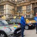 Driving instuctor Tim Elmer (left) receiving the Pudsey top box at Wollaton Hall.
