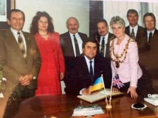 Sally Higgins (in pink) pictured with Ramon Shramovat Mayor of Stryi and others during the twinning