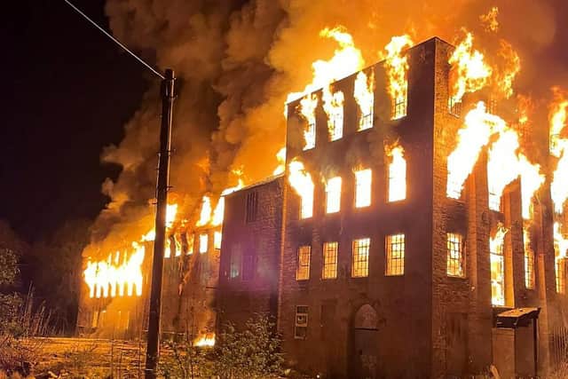 MARCH -- trouble at mill as fire raged through the derelict, historic Hermitage Mill in Mansfield in the early hours of the morning. It took 20 fire engines to tackle the blaze.