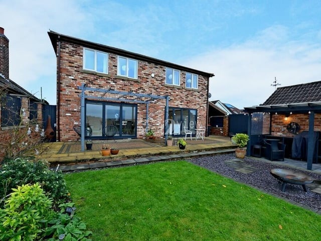 The £575,000 Jacksdale property is as easy on the eye from the rear as it is from the front.