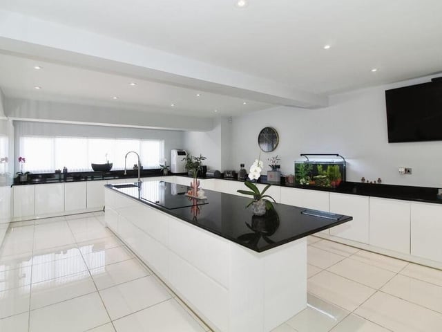Here is our first look at the wonderful, fitted kitchen at the £1.1 million property. With units surrounding a large breakfast island, it is amazingly spacious.