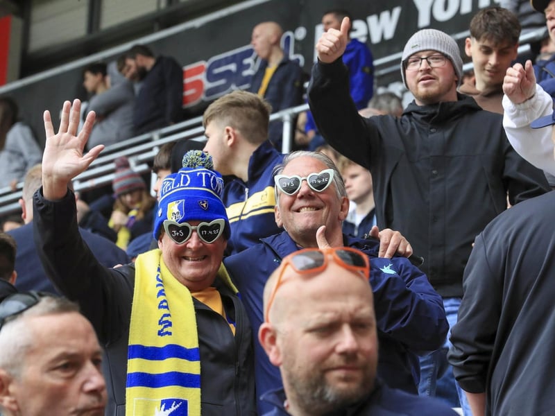 Mansfield Town battled back for a point at Rotherham to edge closer to survival.