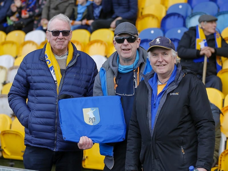 Mansfield Town fans ahead of the draw with Sutton United on 25 Mar 2023.