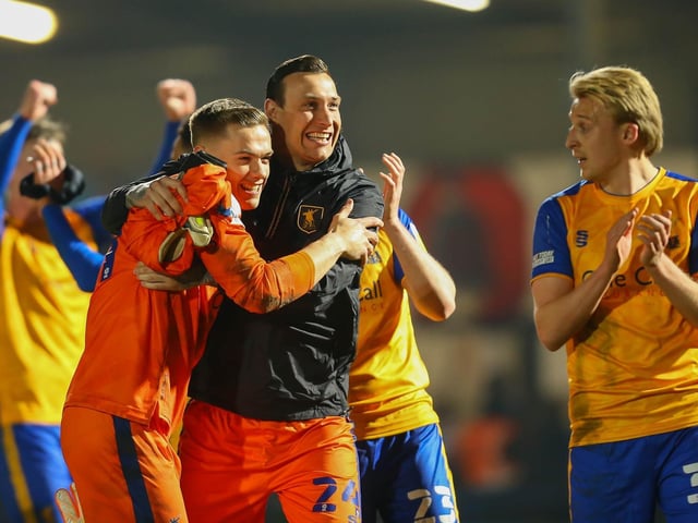 Marek Stech congratulates fellow keeper Nathan Bishop on his clean sheet at Rochdale in March.