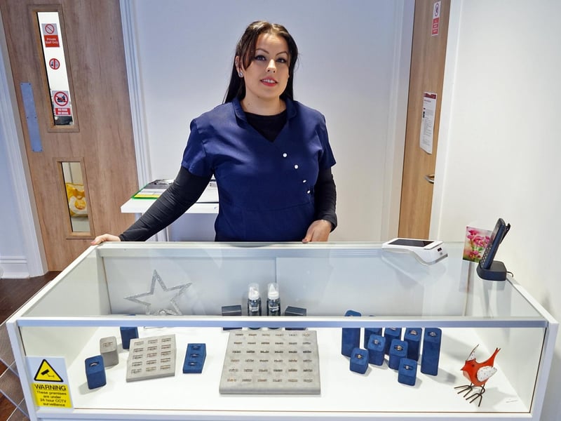 Business owner Paige Broom alongside some of the jewellery items for sale in the shop.