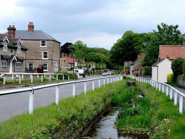 The £550,000 cottage is located on Main Street, where a small stream, known as 'Linby Docks', runs by the roadside.