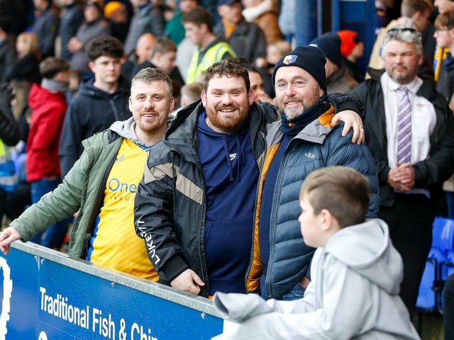 Mansfield Town fans enjoy the win at Stockport County.