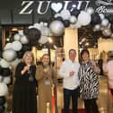 Owners Gary and Joanne Holmes with their staff at the new Zu-Lu Boutique store in the Four Seasons Shopping Centre.