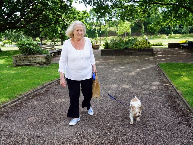 Celia Dilley taking her dog Bella for a walk.