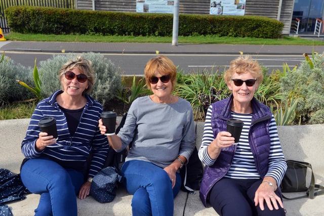 From left, Pam Marley, Liz Lloyd and Carole Vallance enjoy a drink break.