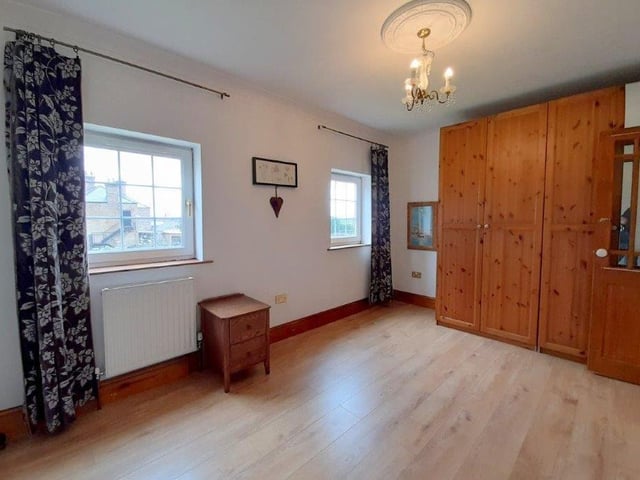Let's move upstairs now and take a look at the first of the bedrooms. It is a good size and full of natural light.