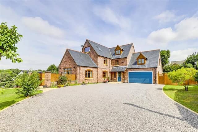 Set back from the road on a generous plot with a large private driveway, the home exudes quality and Kerb appeal.