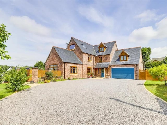 Set back from the road on a generous plot with a large private driveway, the home exudes quality and Kerb appeal.